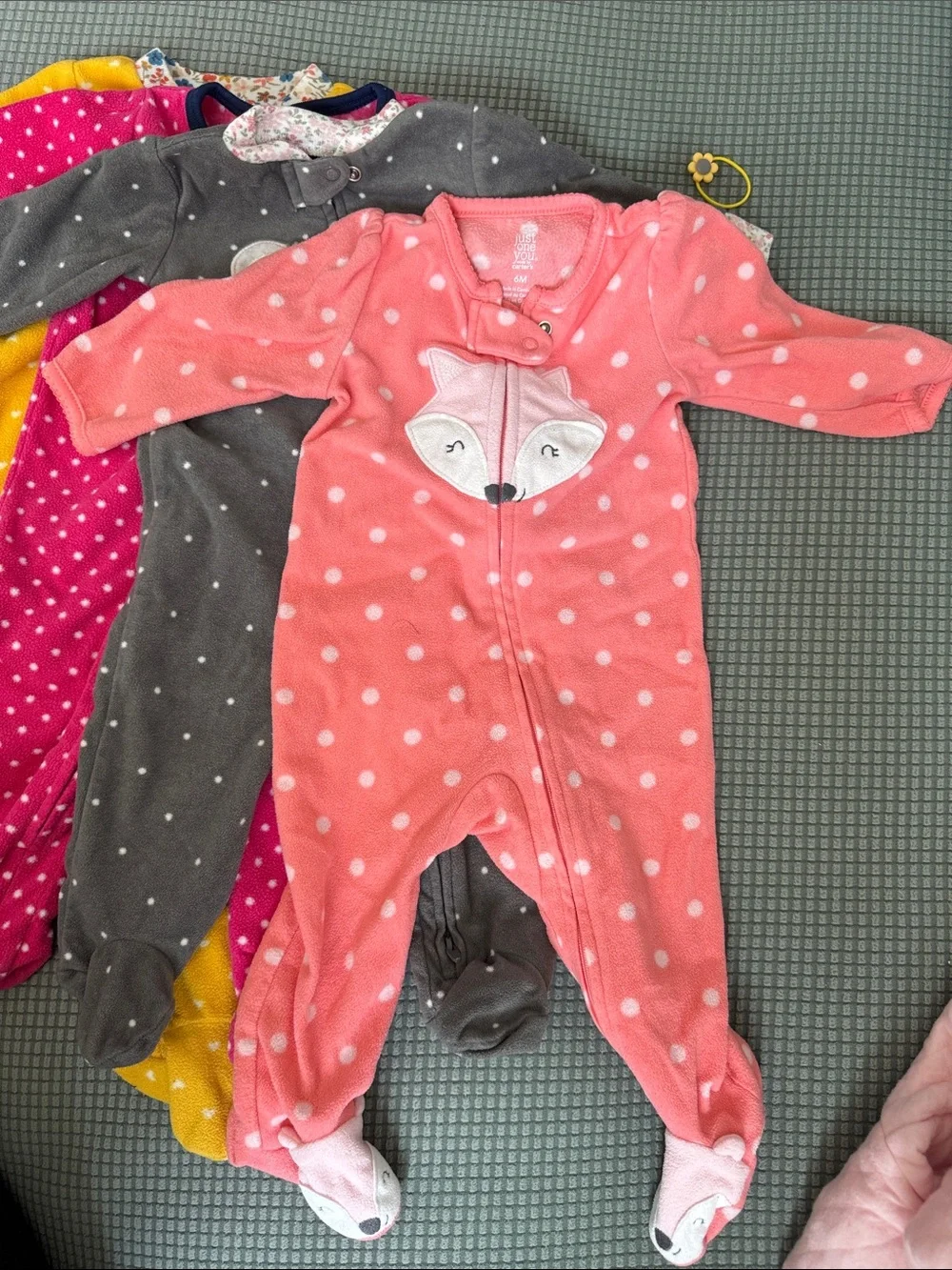 Baby Girls' 4 One-Piece Footed onesie size 6-9M.